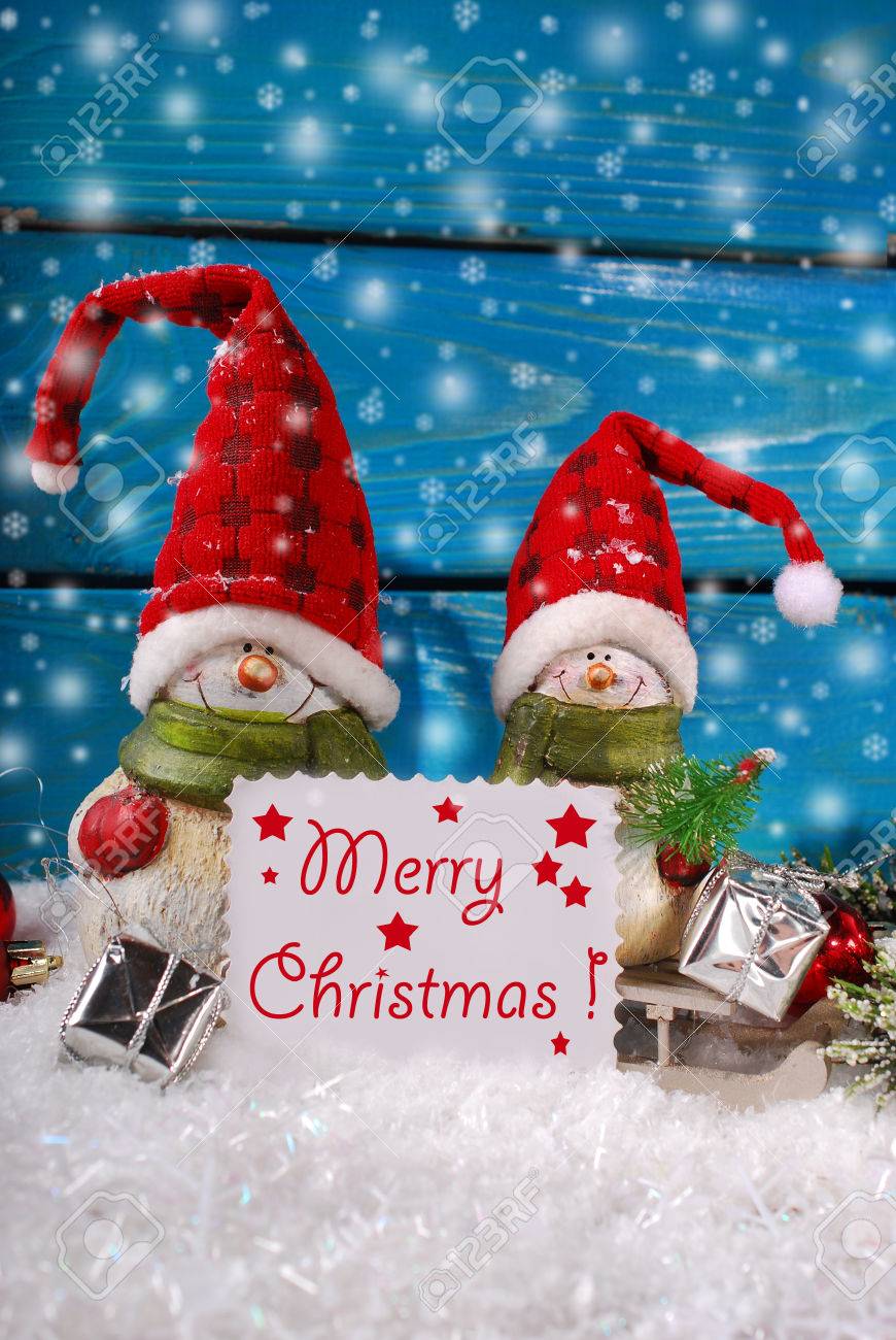 Christmas Decoration With Two Funny Santa Claus Figurines On Blue Wooden Background Stock Photo 33885764 Christmas Decoration With Two Funny Santa Claus Figurines On Blue Wooden Background Stock Photo 33885764