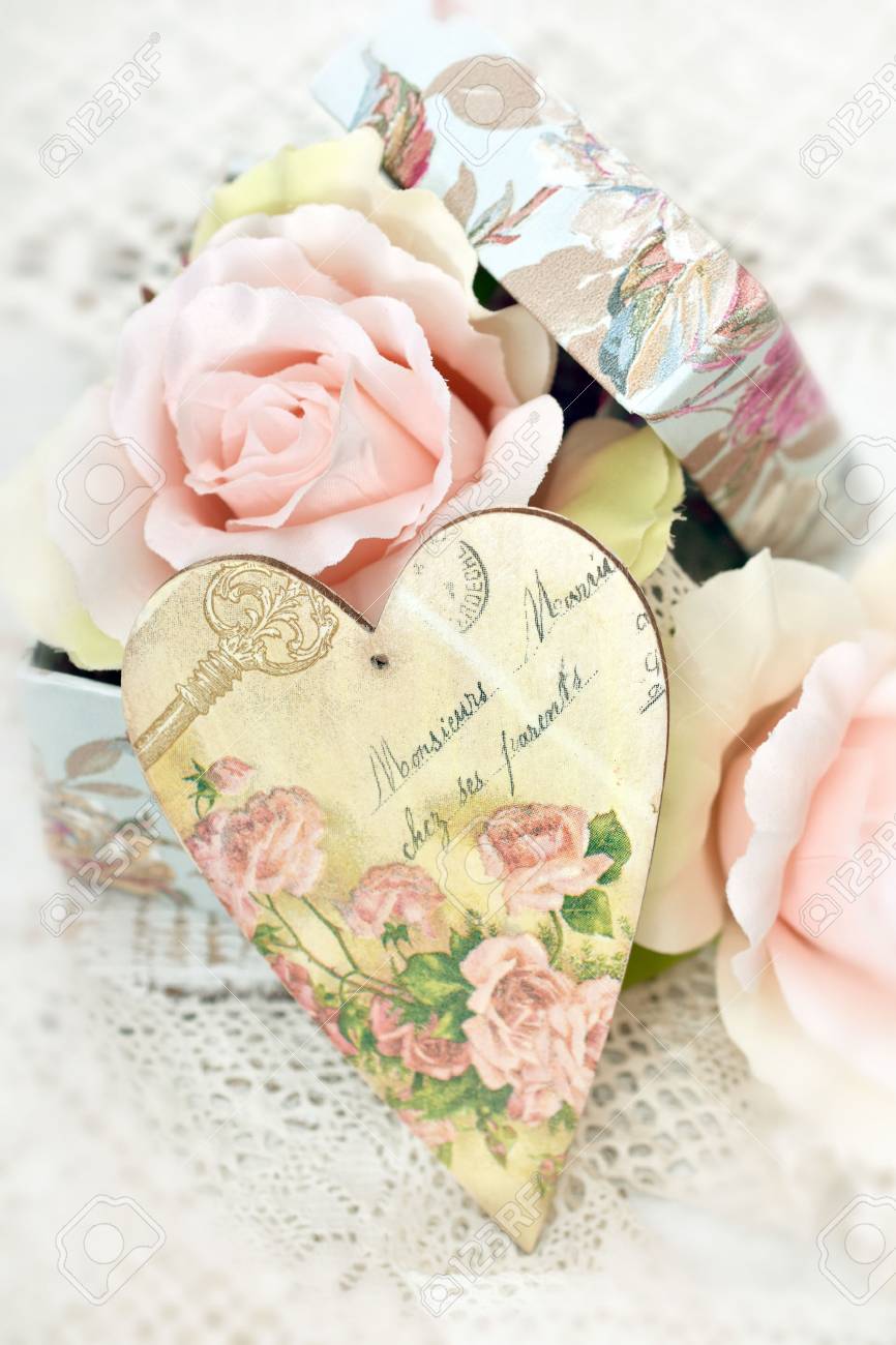 vintage style LOVE decoration with decoupage heart and roses..