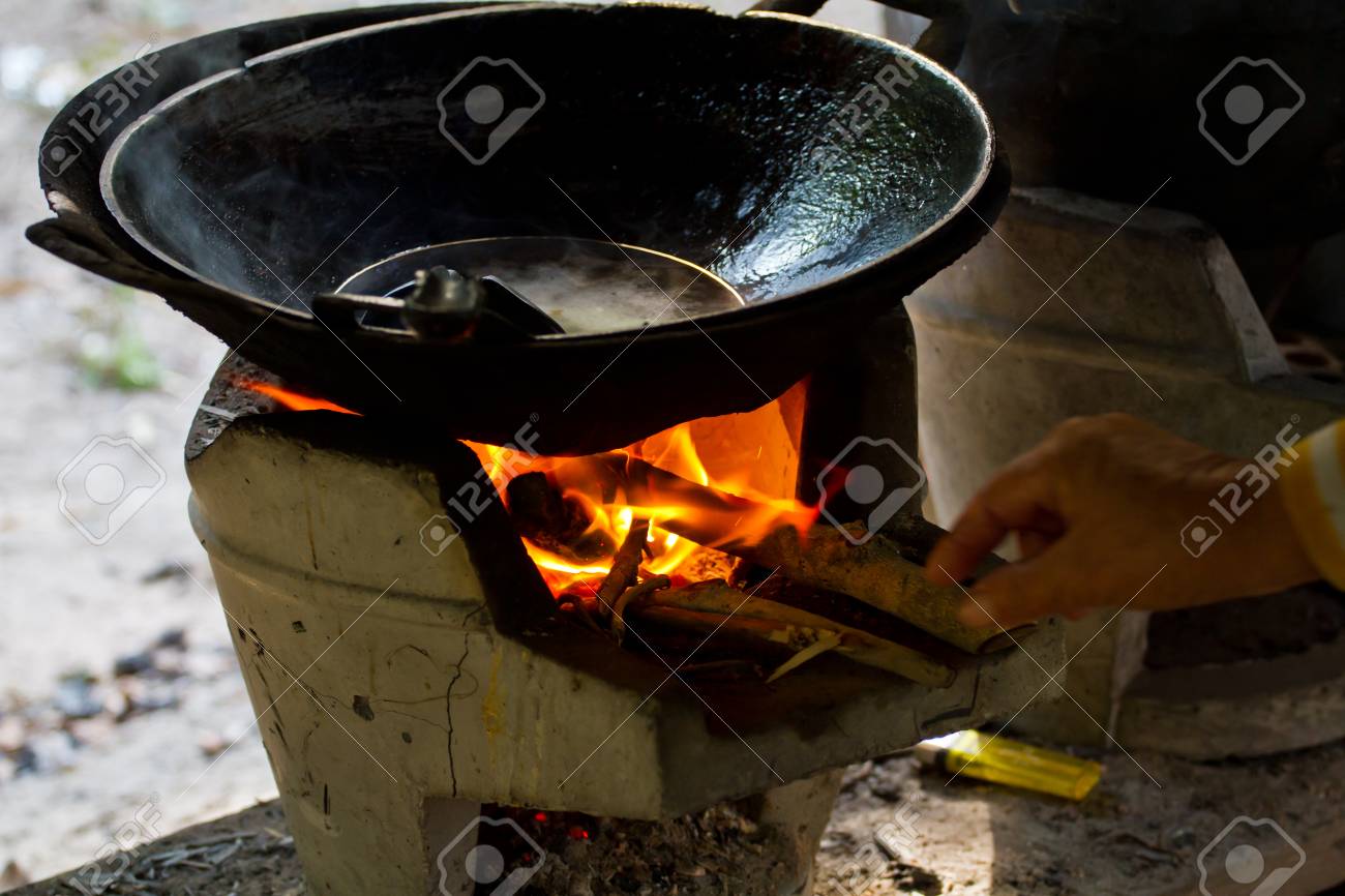 Cook On Pan At The Charcoal Brazier Stock Photo Picture And Royalty Free Image Image 25134018