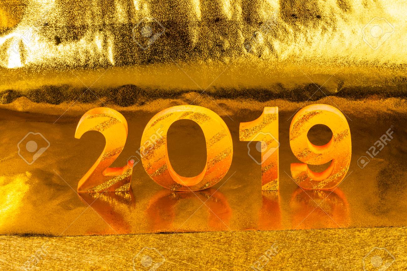 2019 is made in gold color place in golden background is mean