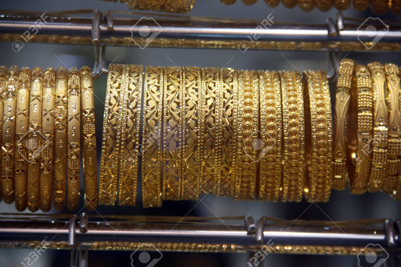 delicate gold bangles
