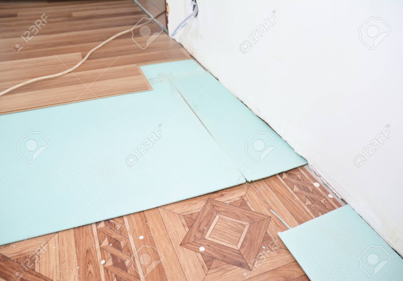 Close Up On Soundproofing And Insulation Laminate Floor Installation Close Up On Soundproofing And Insulation Laminate Floor Installation Stock Photo 89920955