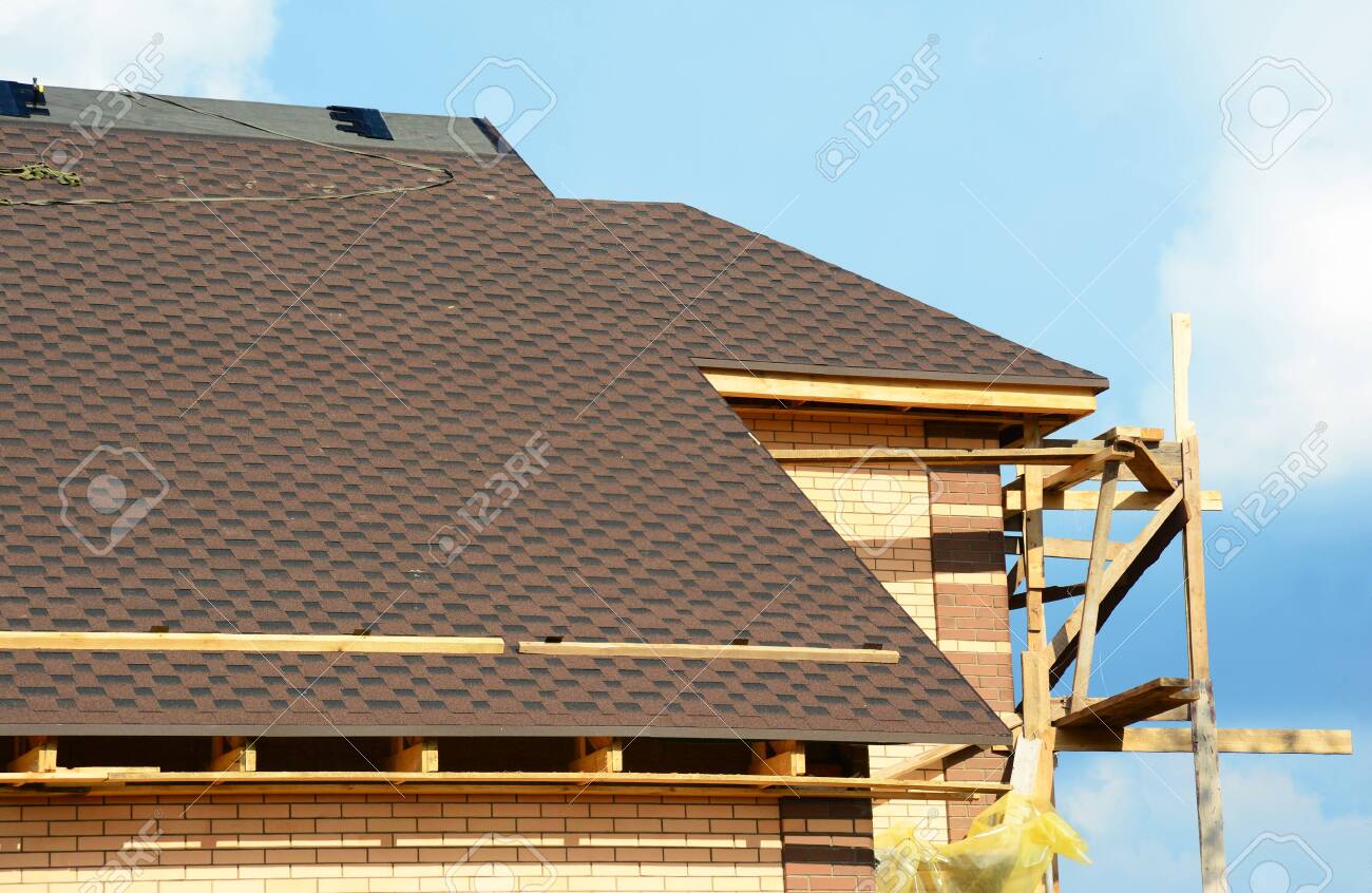 A close-up on unfinished roofing construction, covered with dimensional.. A close-up on unfinished roofing construction, covered with dimensional..