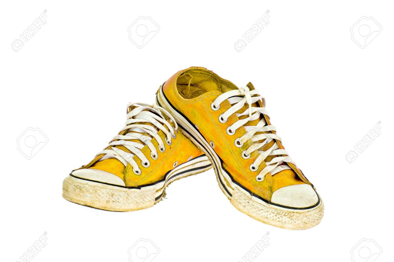 白い背景の上のヴィンテージの黄色い靴 の写真素材 画像素材 Image