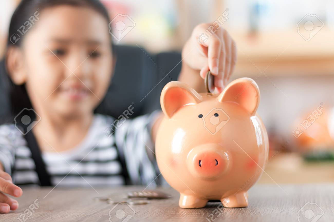 little girl piggy bank