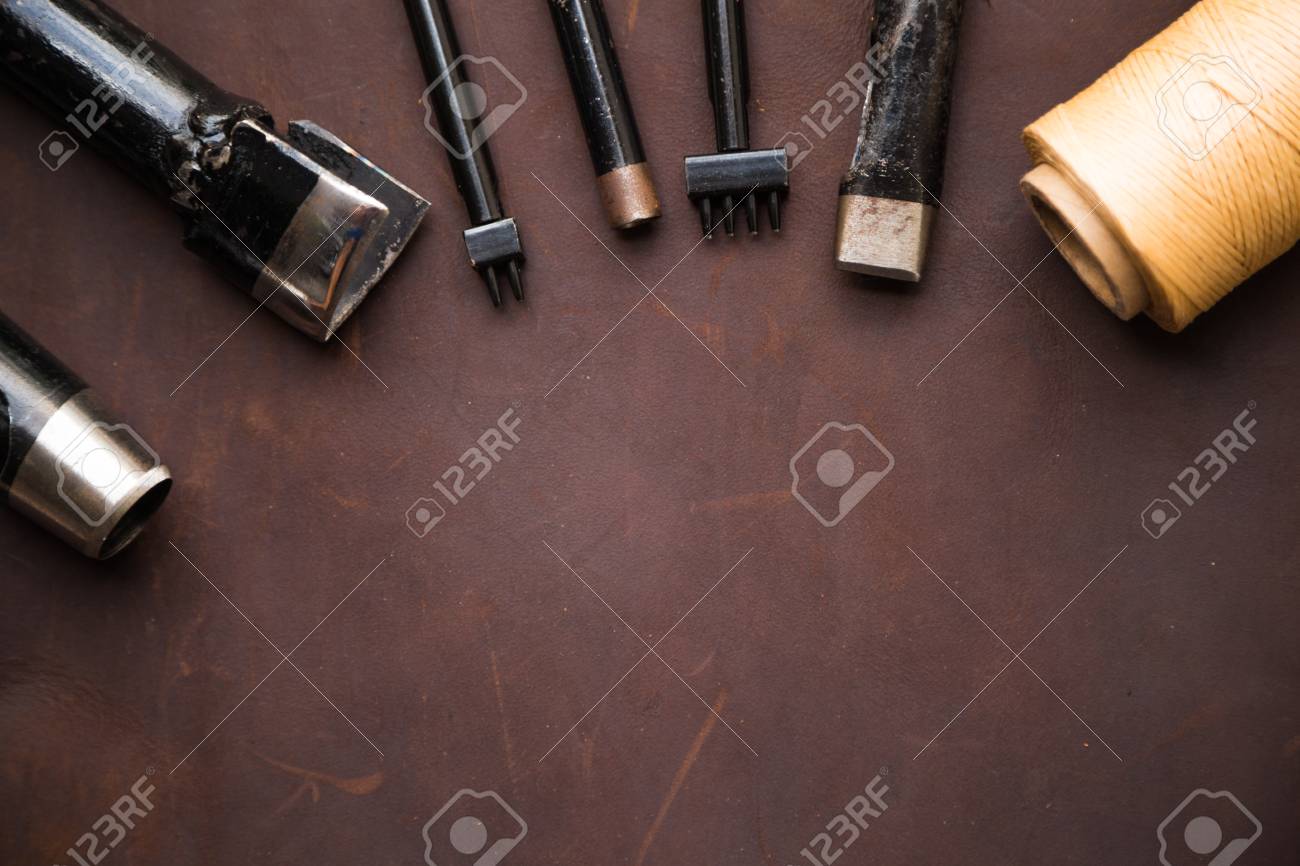 Background of leather craftsmanship with tool for handmade product - 64910046 Background of leather craftsmanship with tool for handmade product - 64910046