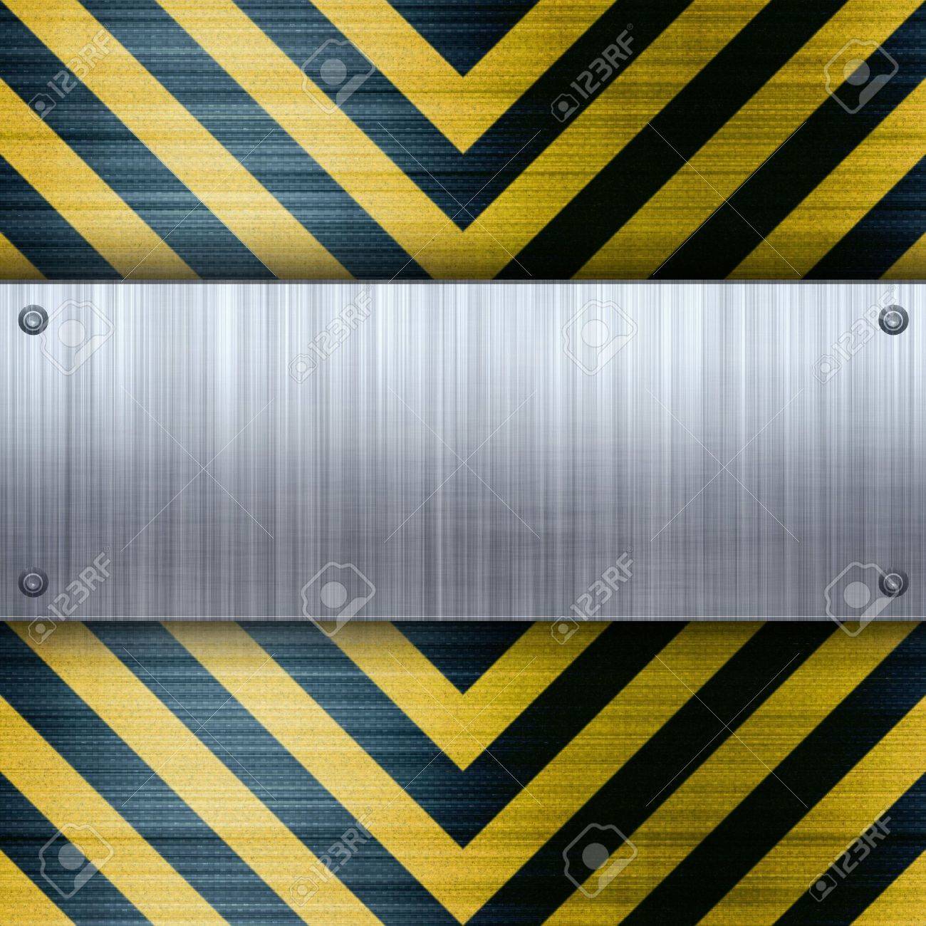 A Riveted Brushed Aluminum Plate On A Construction Hazard Stripes