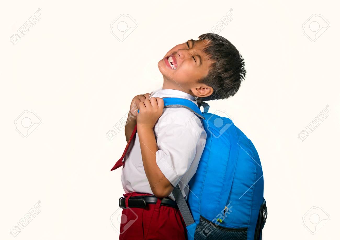 kid carrying backpack