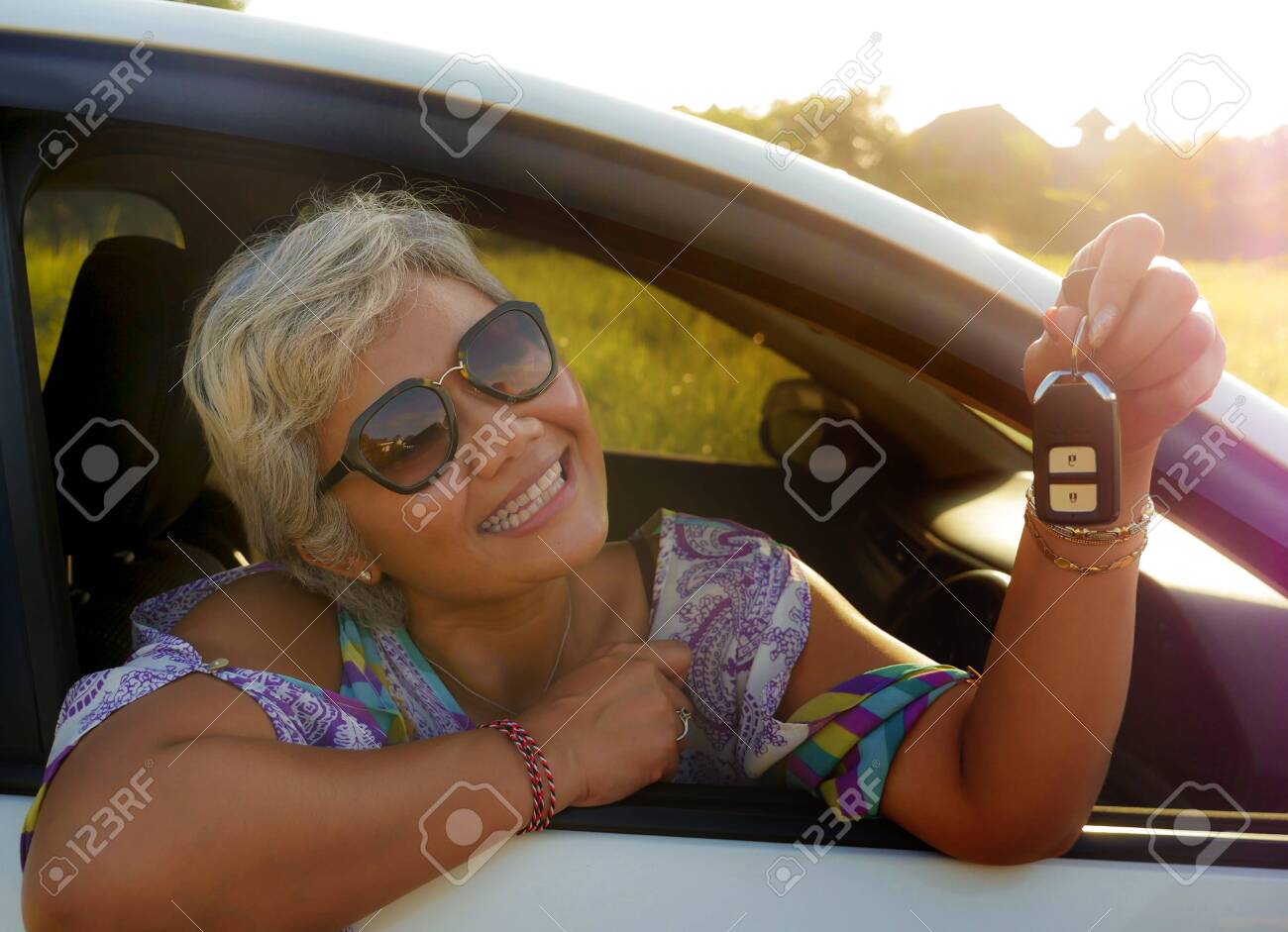 Lifestyle Portrait Of Attractive And Happy Middle Aged Asian
