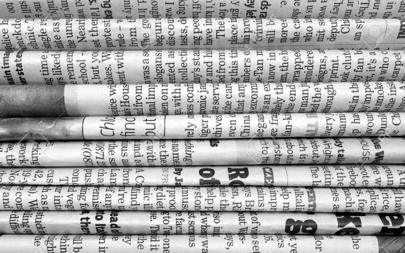 A Black And White Background Of English Language Newspapers Stacked Folded In Horizontal Position A Black And White Background Of English Language Newspapers Stacked Folded In Horizontal Position