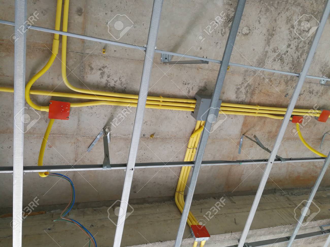 Ceiling under construction and home wiring duct Stock Photo - 84610653