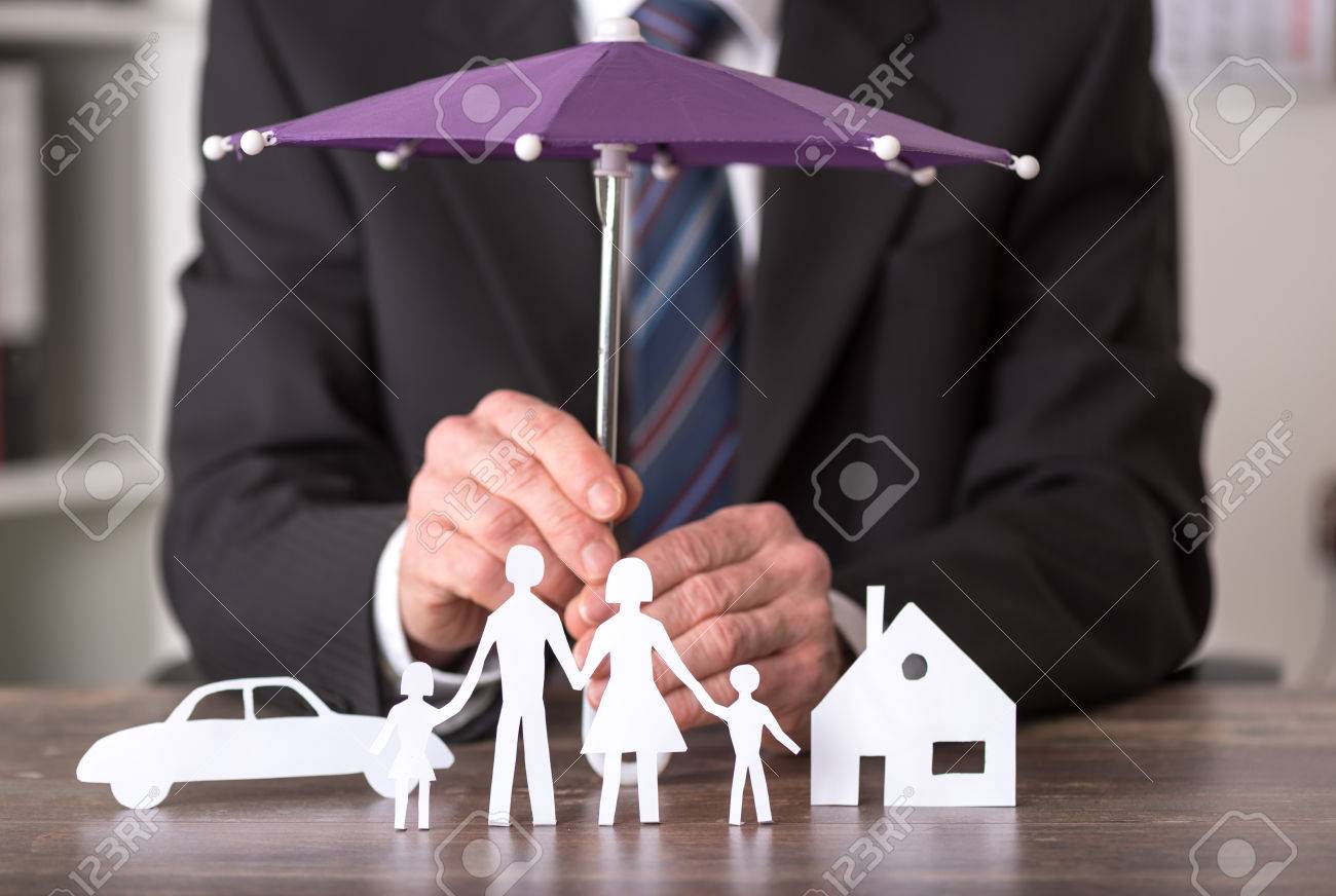 Concept of insurance with umbrella over a house, a car and a family - 53357629 Concept of insurance with umbrella over a house, a car and a family - 53357629