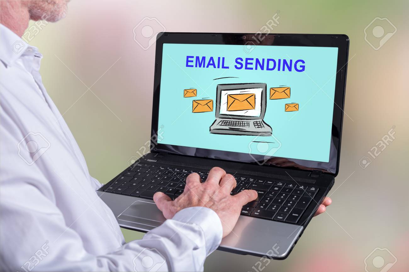 Man Using A Laptop With Email Sending Concept On The Screen Stock Photo,  Picture and Royalty Free Image. Image 88467883.