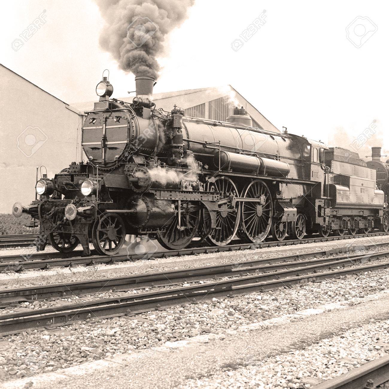 Side View Of An Old-fashioned Steam Locomotive In A Austrian Railway  Station. Scan From A B \u0026 W Negative. Stock Photo, Picture and Royalty Free  Image. Image 39274894., image size:1300x1300