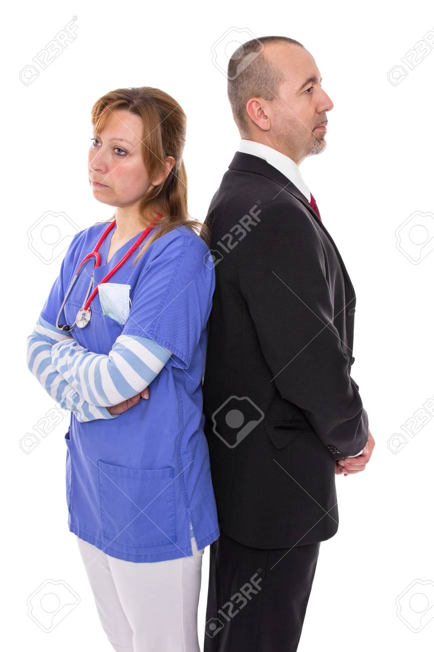 Doctor stands back to back with her boss - 27711948 Doctor stands back to back with her boss - 27711948