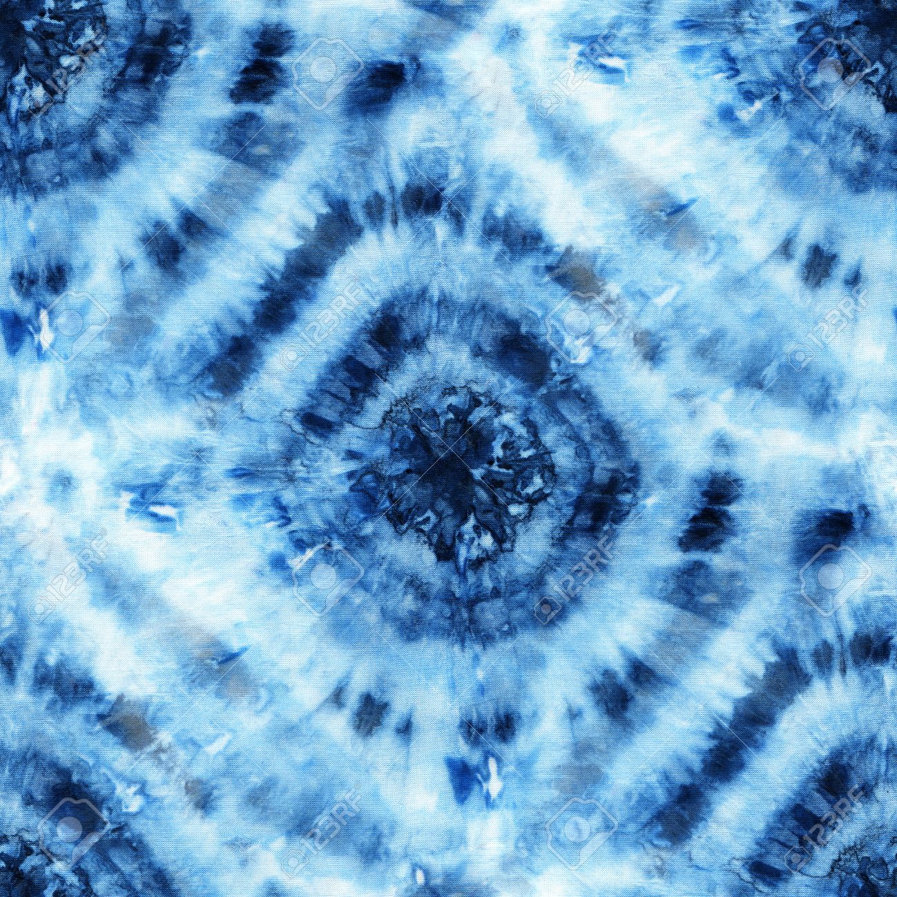 Seamless tie-dye pattern of indigo color on white silk. Hand painting fabrics - nodular batik. Shibori dyeing. - 83103143 Seamless tie-dye pattern of indigo color on white silk. Hand painting fabrics - nodular batik. Shibori dyeing. - 83103143