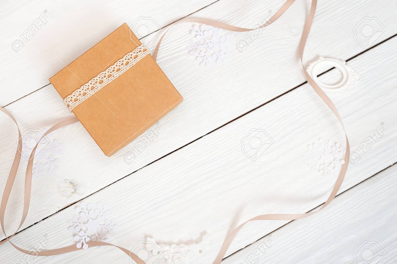 Download Christmas Box With Kraft Paper And Ribbon Mockup On A White Stock Photo Picture And Royalty Free Image Image 89402541