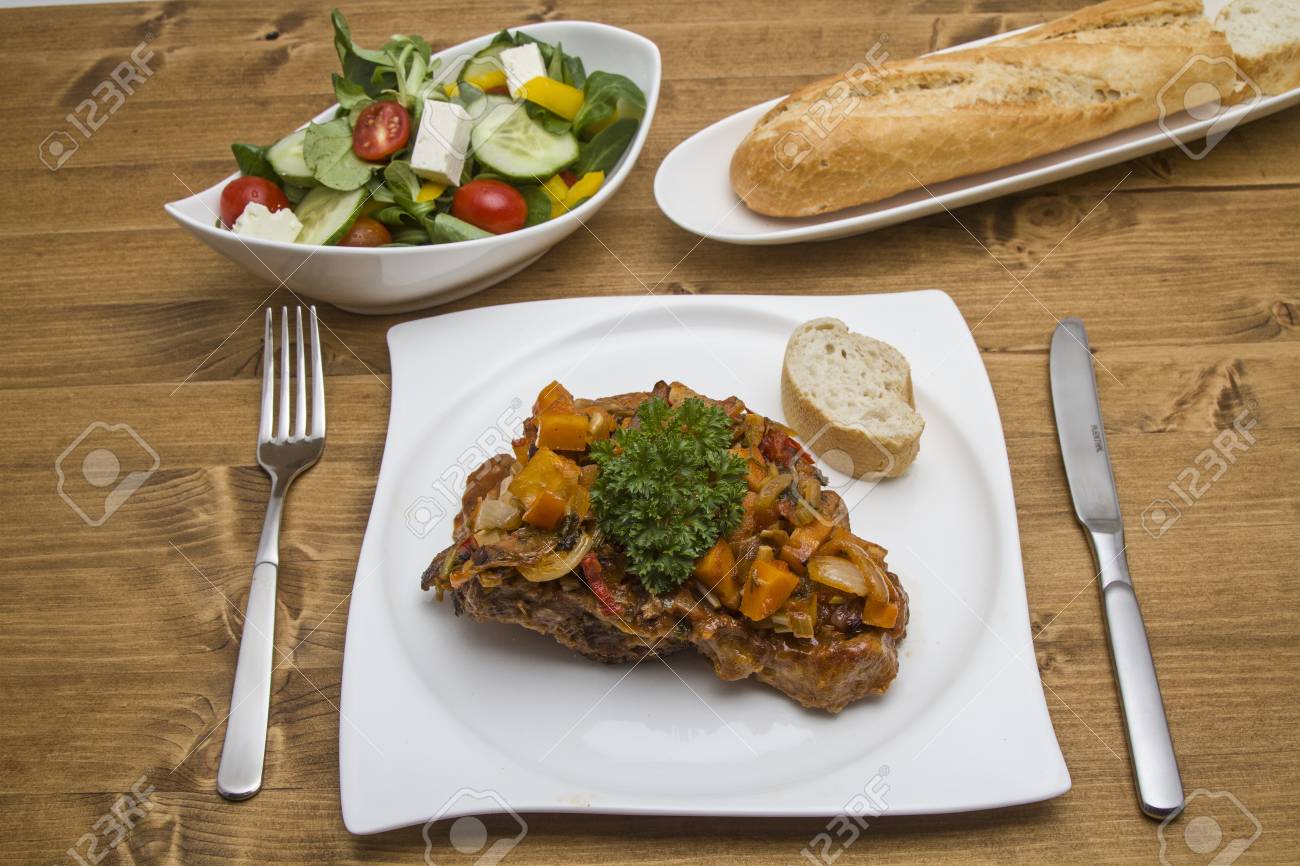 Ossobuco alla milanese is a traditional stew from Italy - 33486241 Ossobuco alla milanese is a traditional stew from Italy - 33486241