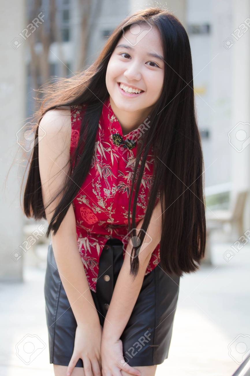 Portrait Of Thai Teen Beautiful Girl In Chinese Dress Relax And Smile Stock Photo Picture And Royalty Free Image Image 103793564