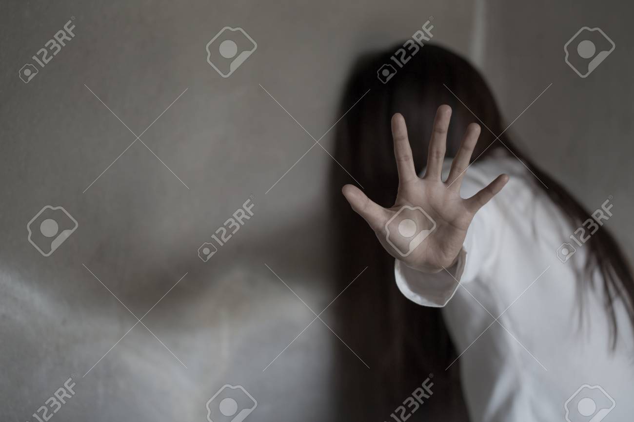 Woman in angle of abandoned building , stop violence against Women, international women's day - 116339759 Woman in angle of abandoned building , stop violence against Women, international women's day - 116339759