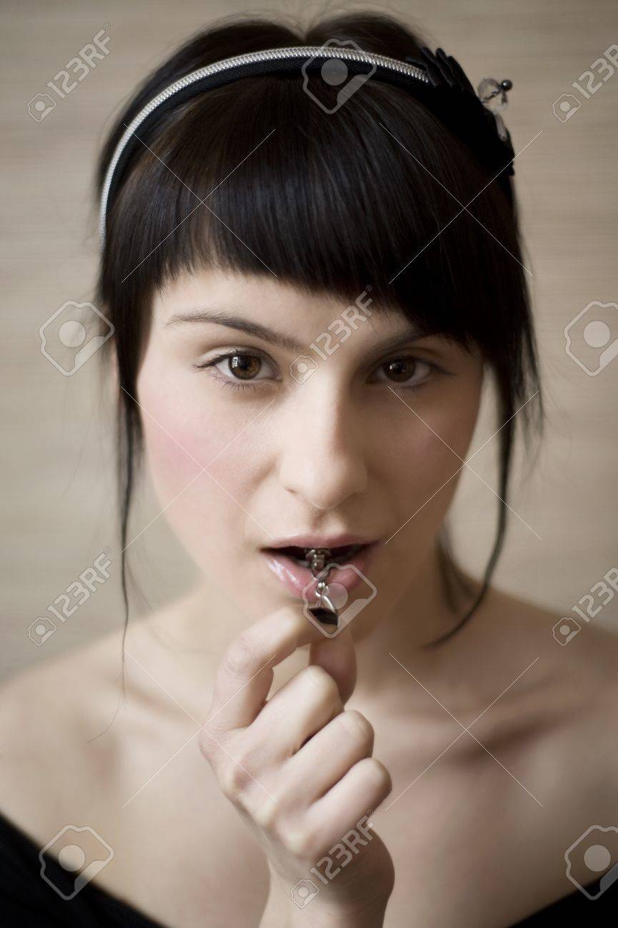 portrait of a young attractive woman with zipper in lips - 10742090 portrait of a young attractive woman with zipper in lips - 10742090