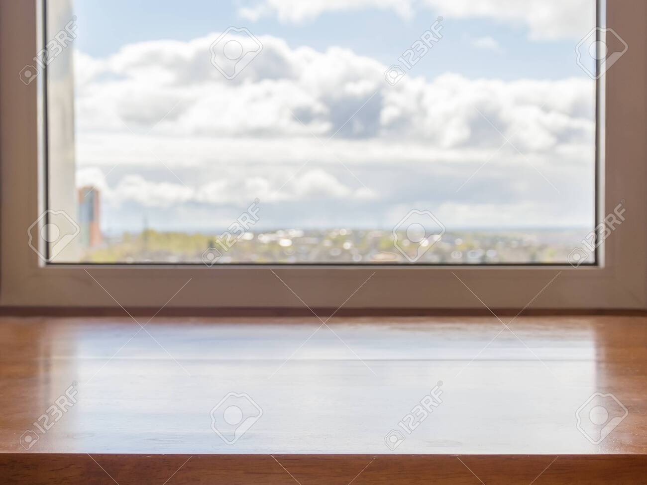 Window with a wooden window sill and landscape in it - 144232386 Window with a wooden window sill and landscape in it - 144232386