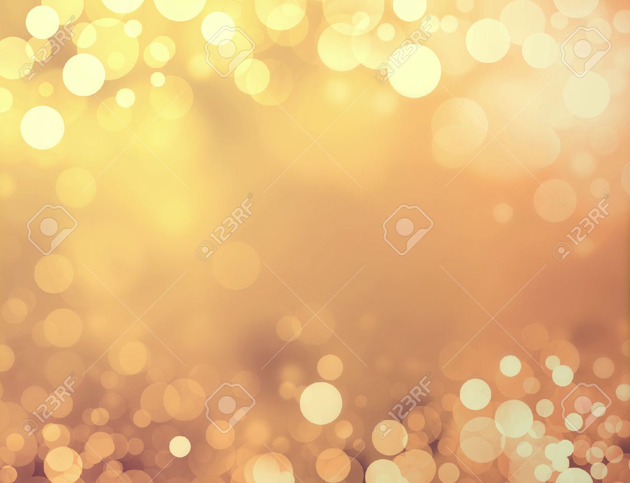 shiny gold background with blurry circles and sparkles stock photo gold backgrounds
