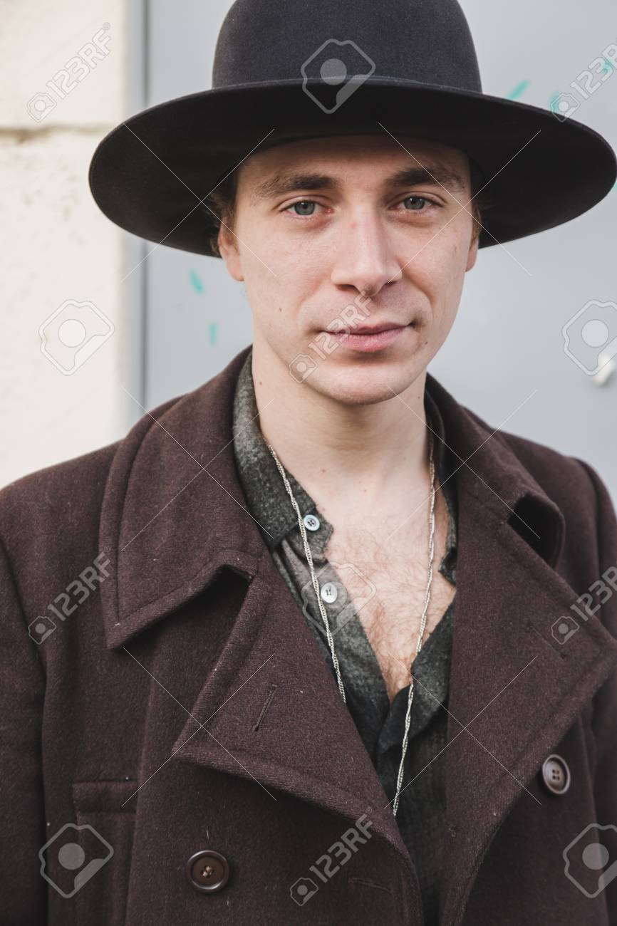 MILAN, ITALY , JANUARY 14 Fashionable man poses outside Federico..