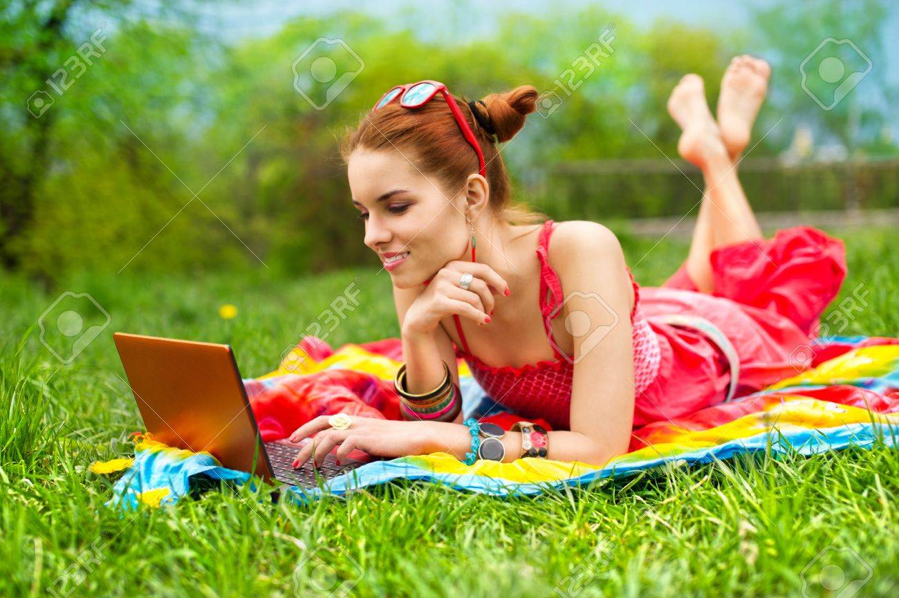 Beautiful woman with laptop - 9557988 Beautiful woman with laptop - 9557988