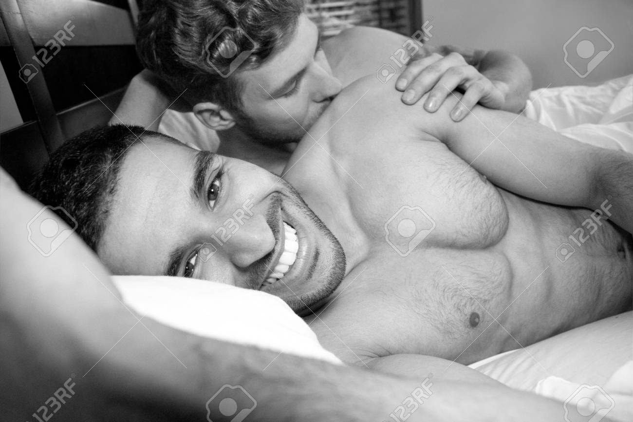 Naked, Gay Lovers, Husbands In Bed, Cuddling And Laughing Stock Photo,  Picture and Royalty Free Image. Image 102577161.