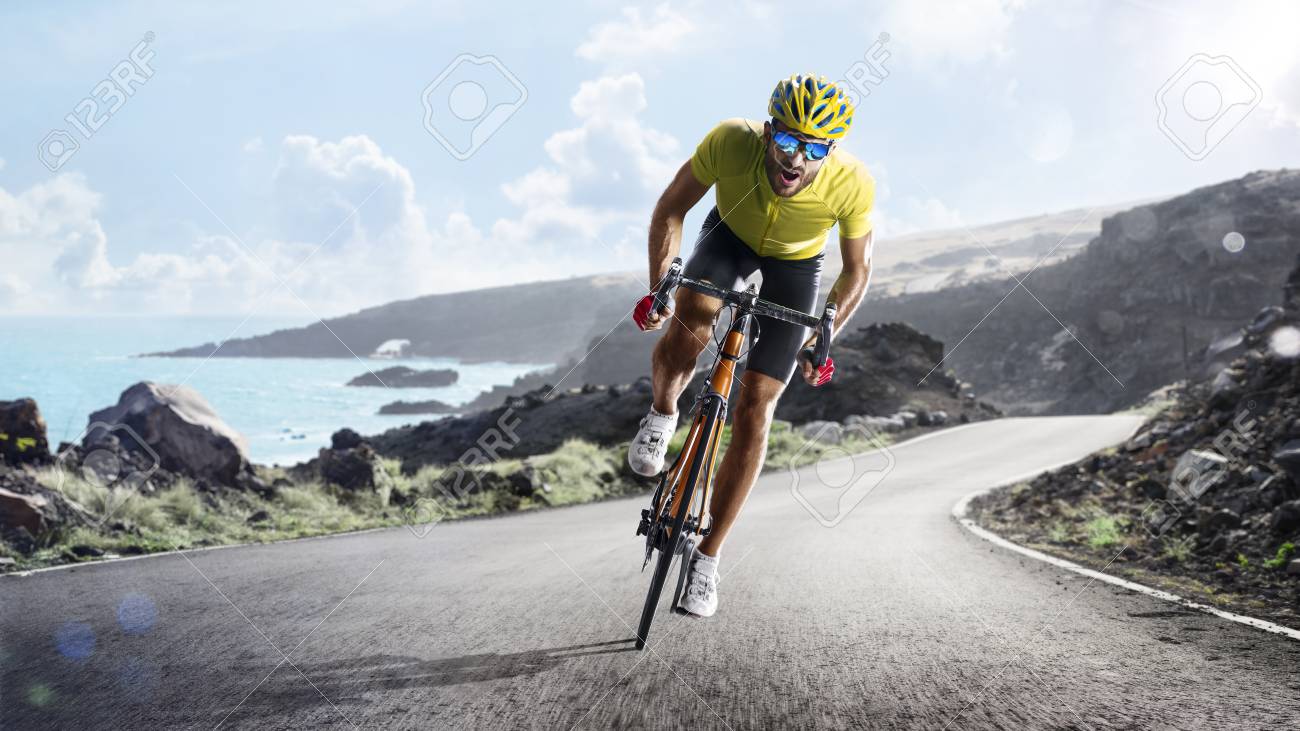 Professional road bicycle racer in action - 99118349 Professional road bicycle racer in action - 99118349