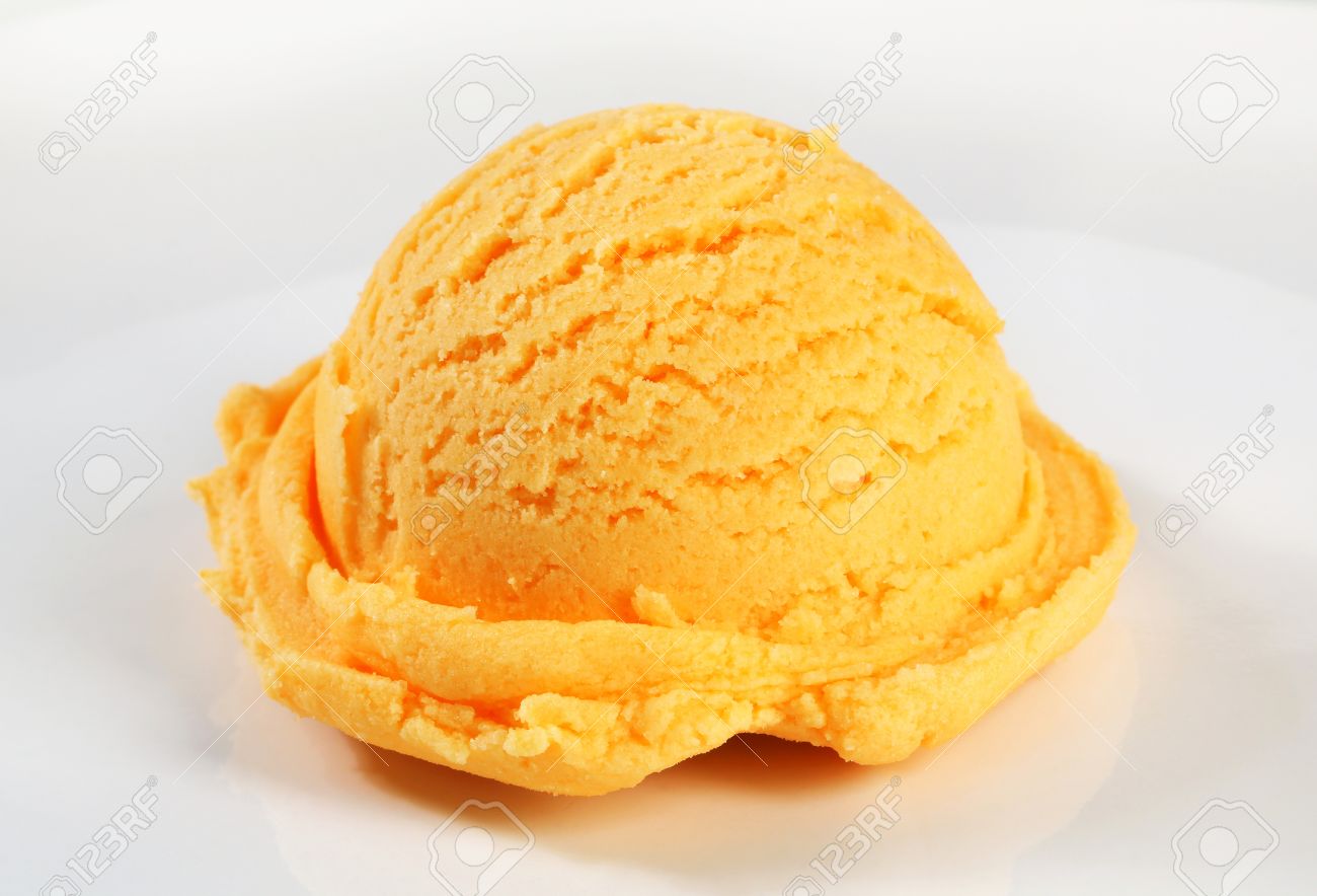 scoop of orange ice cream stock photo picture and royalty free