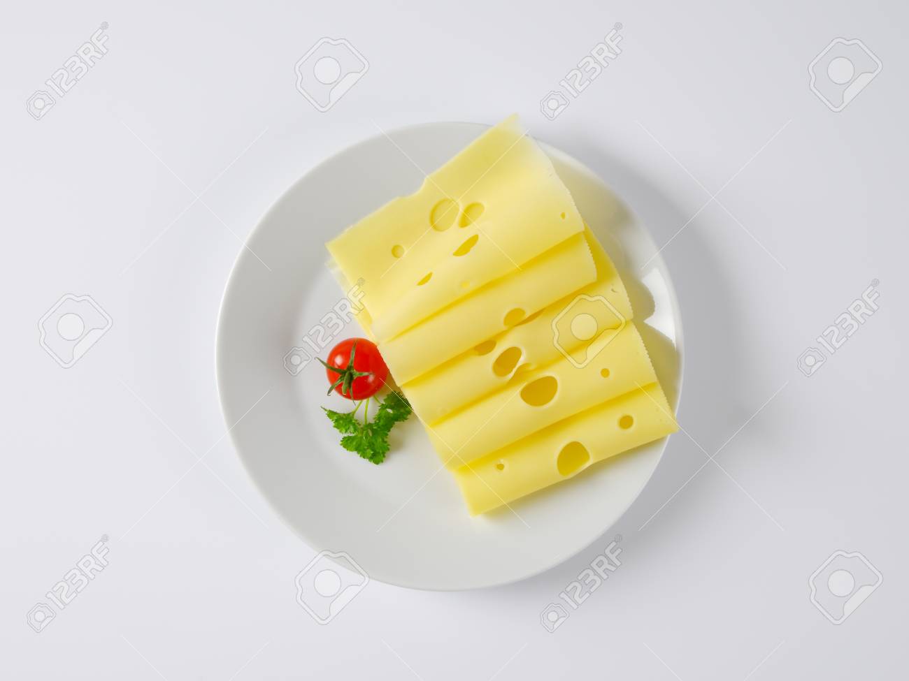 In Scheiben Geschnitten Schweizer Kase Auf Dem Teller Lizenzfreie Fotos Bilder Und Stock Fotografie Image 54292917