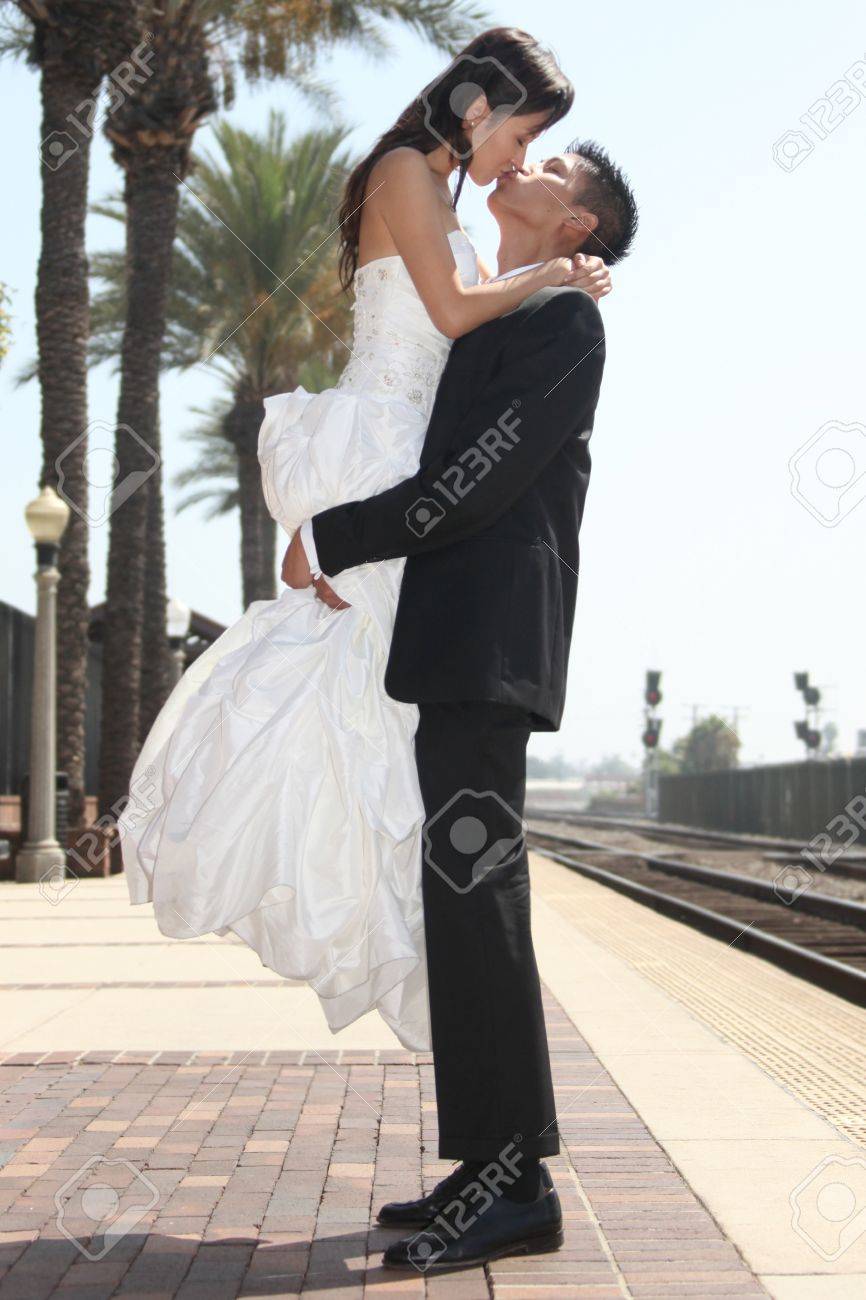 Asian American Wedding Couple Outdoors Stock Photo Picture And