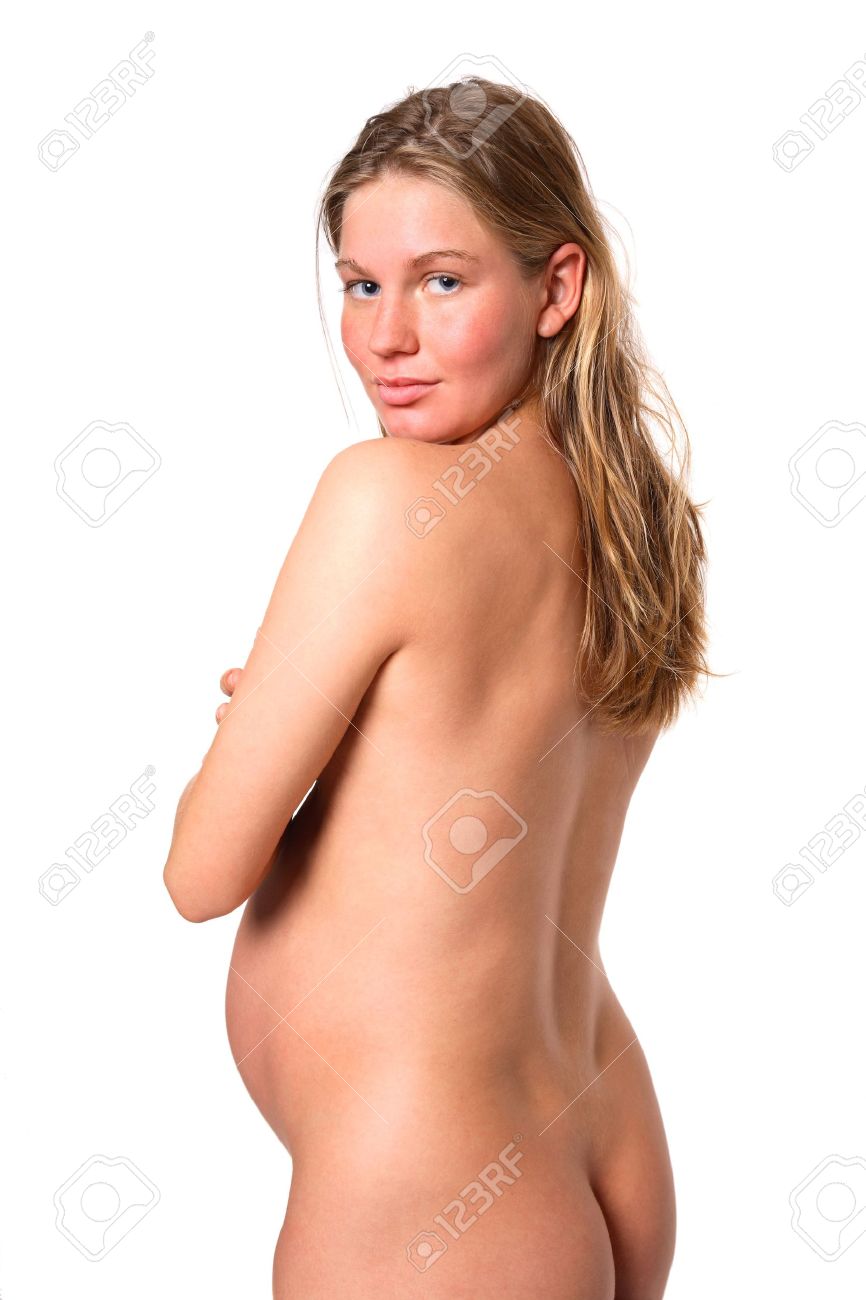 866px x 1300px - Young nude pregnant woman, looks over her shoulder