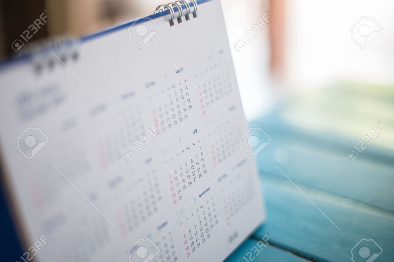 Blurred calendar page blue background. - 50281886 Blurred calendar page blue background. - 50281886