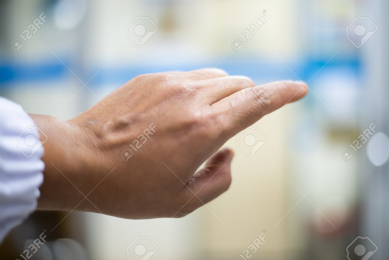 Hand scientis with out glove on blur background. - 167720652 Hand scientis with out glove on blur background. - 167720652