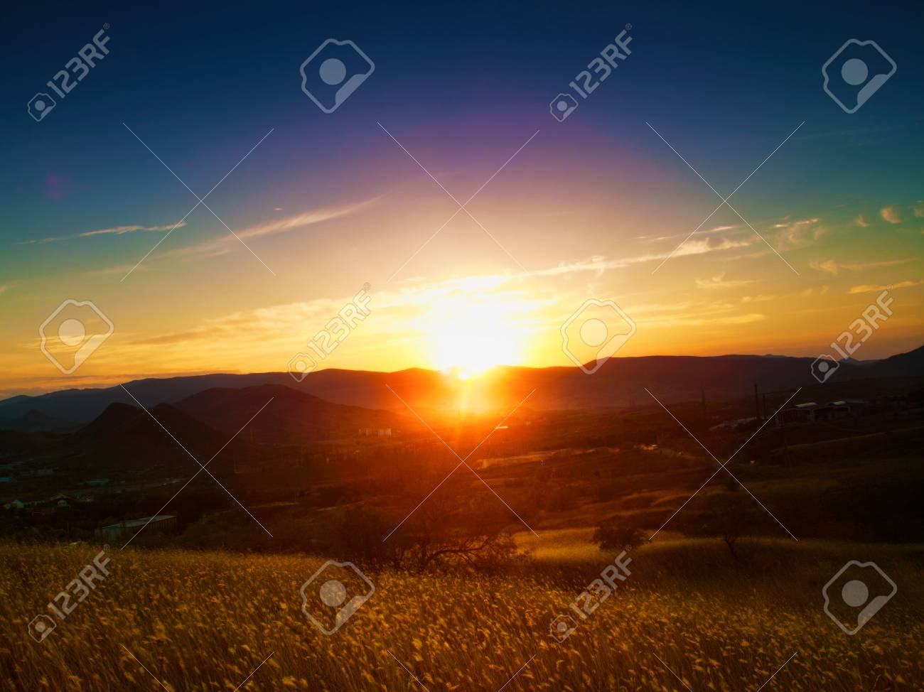 Dramatic sunset over valley. Natural seasonal landscape - 22510436 Dramatic sunset over valley. Natural seasonal landscape - 22510436