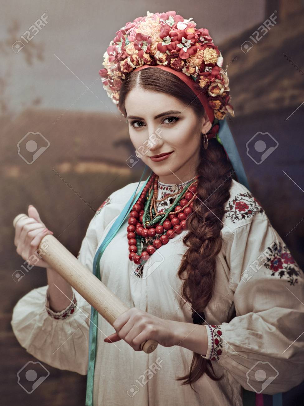 https://previews.123rf.com/images/tolokonov/tolokonov1806/tolokonov180600061/103389374-ethno-beauty-beautiful-young-woman-in-traditional-ukrainian-dress-and-crown.jpg