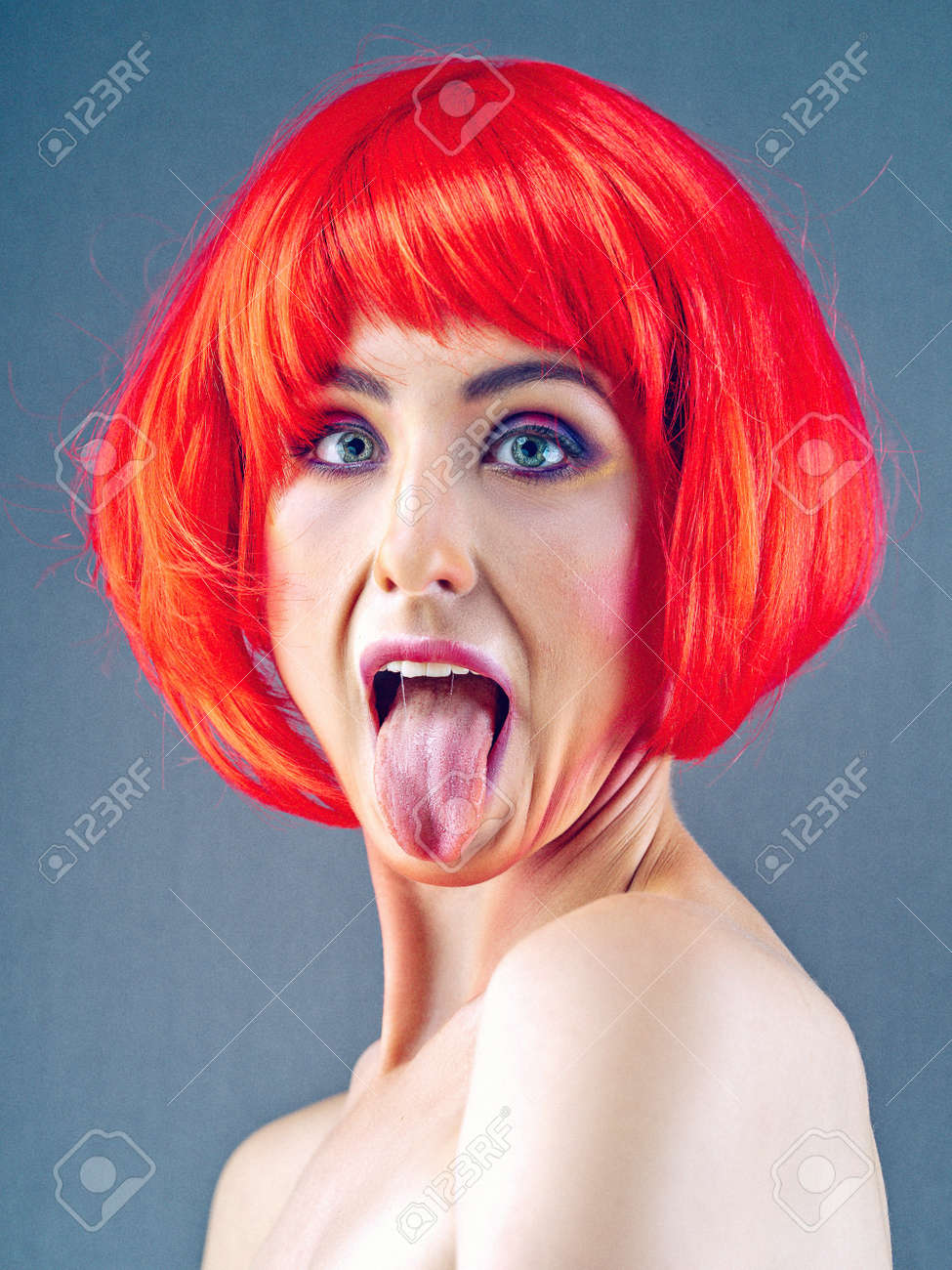 Tricky beauty. Funny female portrait withcrazy makeup end hair style - 168857972 Tricky beauty. Funny female portrait withcrazy makeup end hair style - 168857972