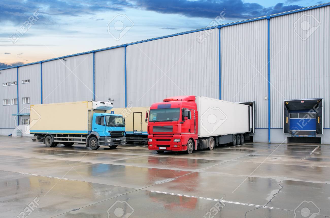 Cargo truck at warehouse building - 94381466 Cargo truck at warehouse building - 94381466