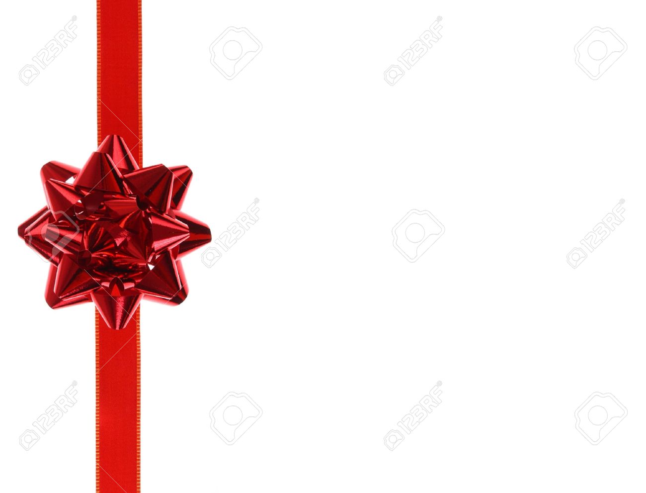 red holiday ribbon bow on white background stock photo picture and holiday ribbon