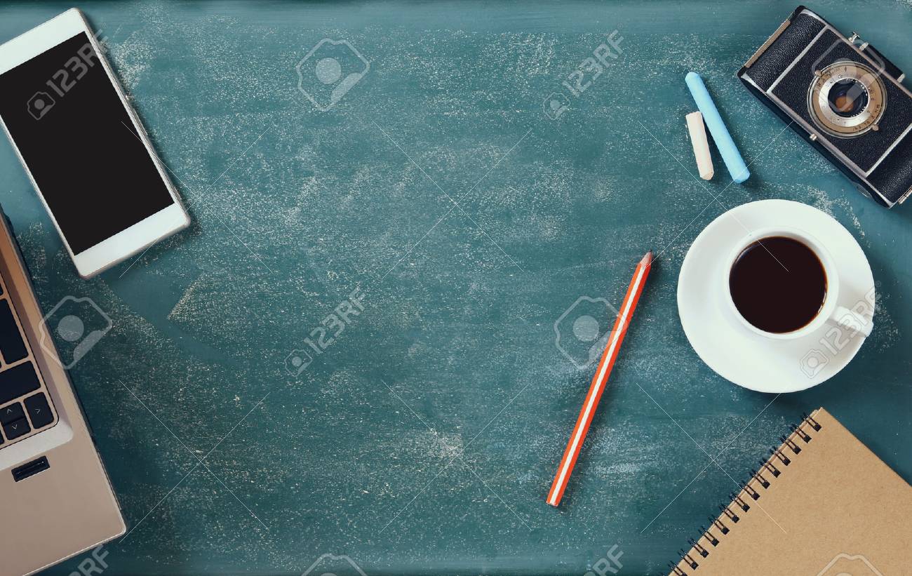 top view image of mobile phone, cup of coffee and laptop over blackboard background - 51155993 top view image of mobile phone, cup of coffee and laptop over blackboard background - 51155993