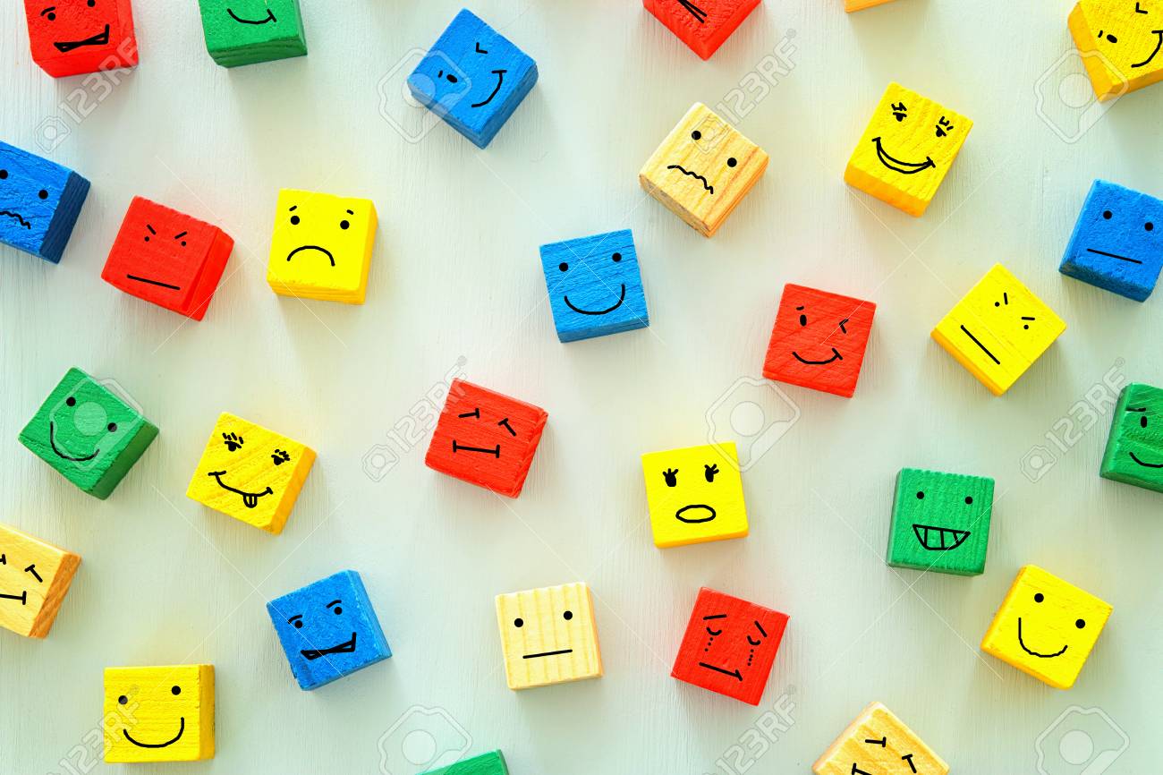 concept of Different emotions drawn on colorfull cubes, wooden background. - 113499354 concept of Different emotions drawn on colorfull cubes, wooden background. - 113499354