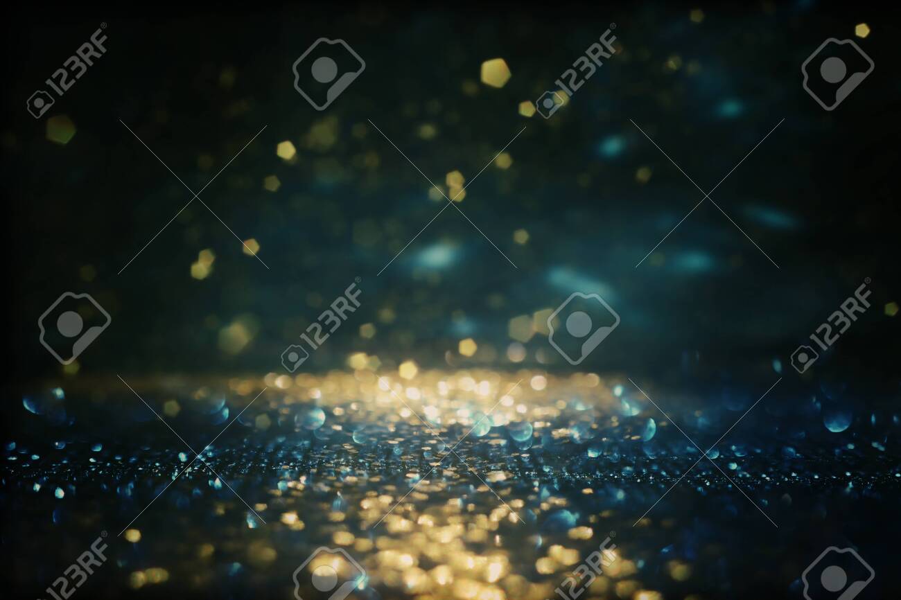 background of abstract glitter lights. gold, blue and black. de focused - 149541312 background of abstract glitter lights. gold, blue and black. de focused - 149541312