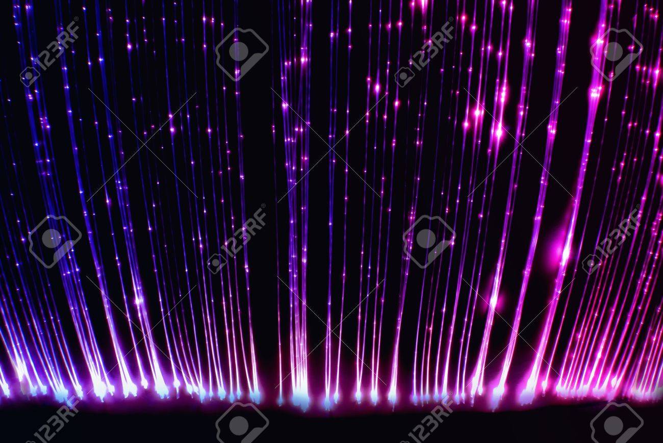 pink and purple fiber optic light cables stock photo picture and