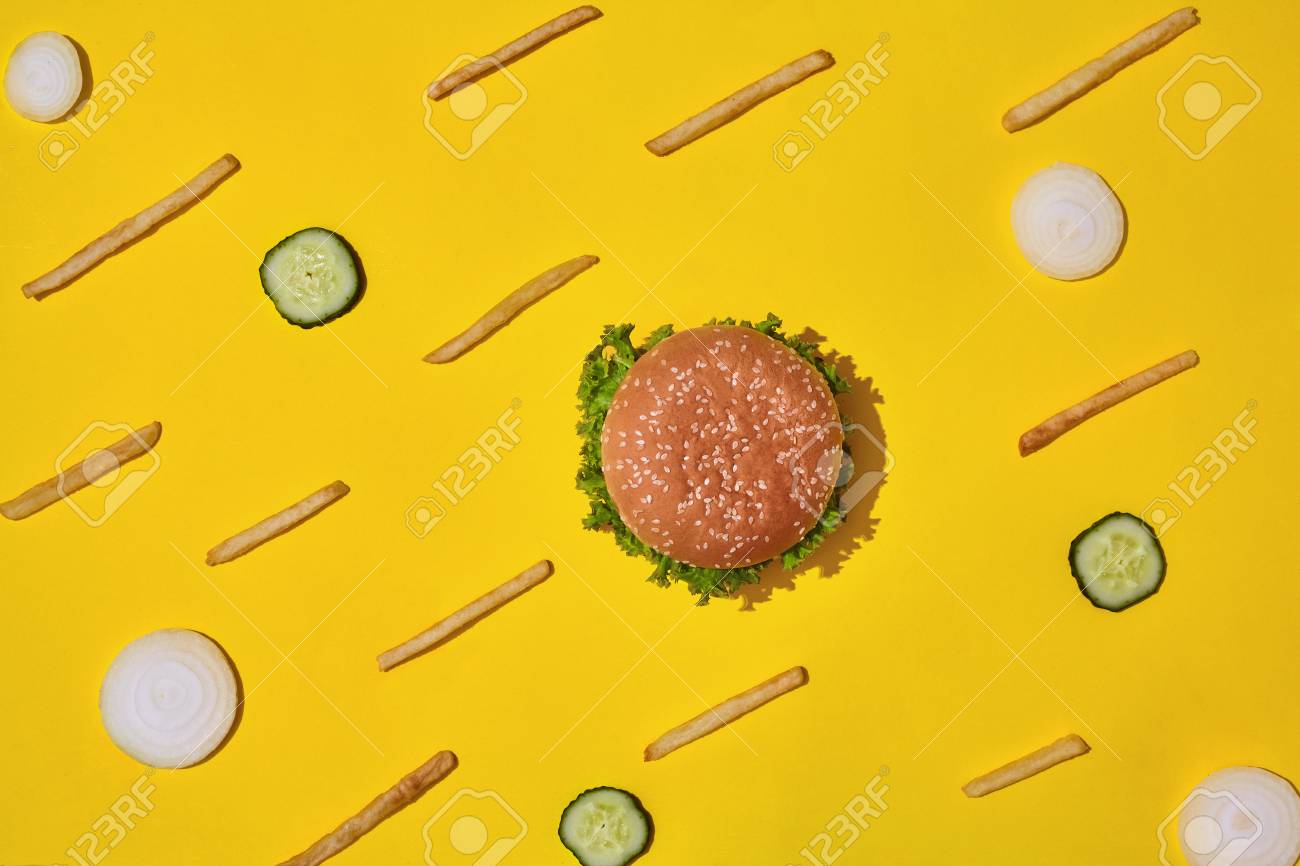Design Concept Of Mockup Burger And French Fries Set On Yellow Stock Photo Picture And Royalty Free Image Image 104426483