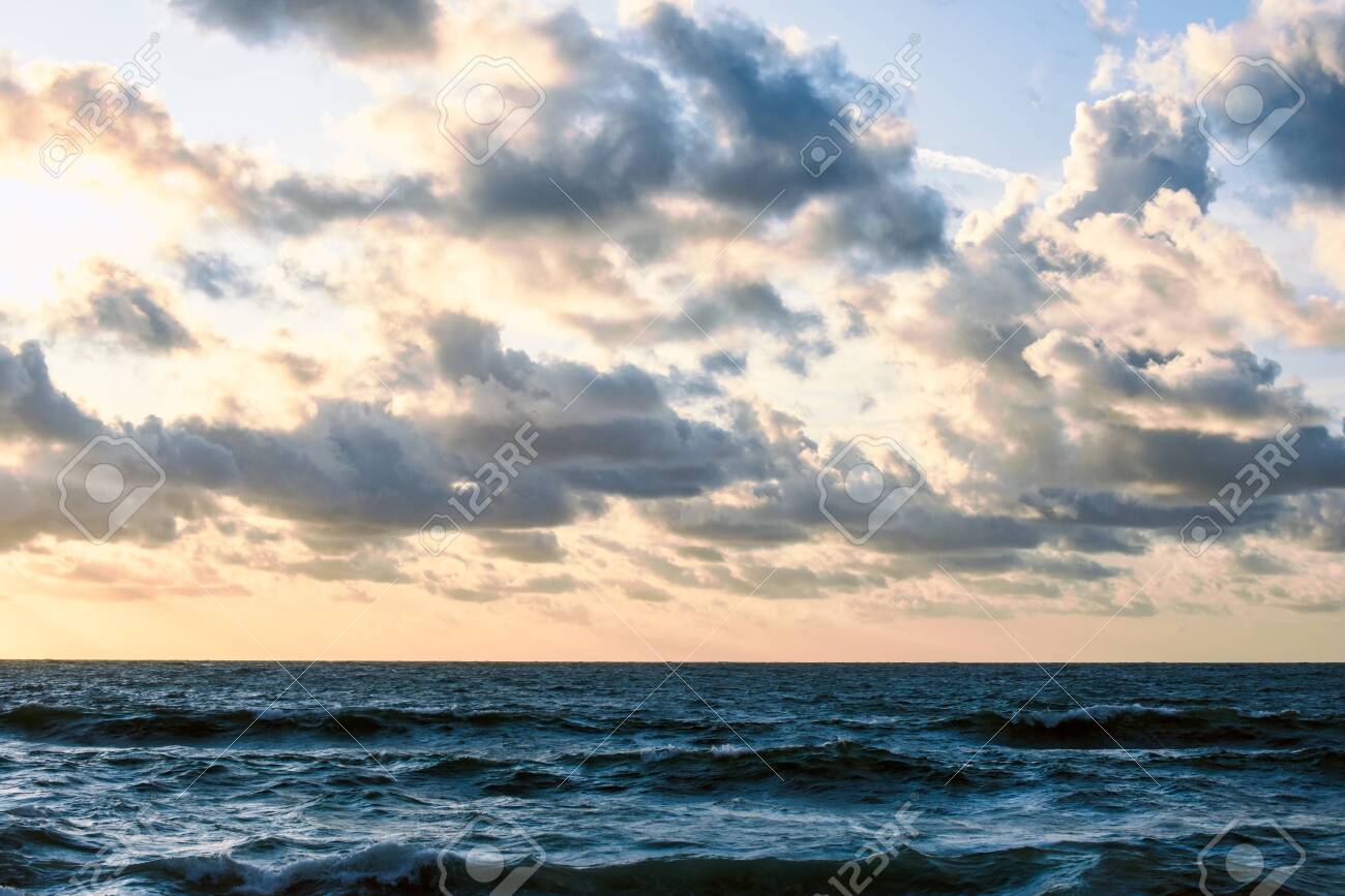 The Ocean Rough Sea Water With Horizon And Clouds During Evening Stock Photo Picture And Royalty Free Image Image
