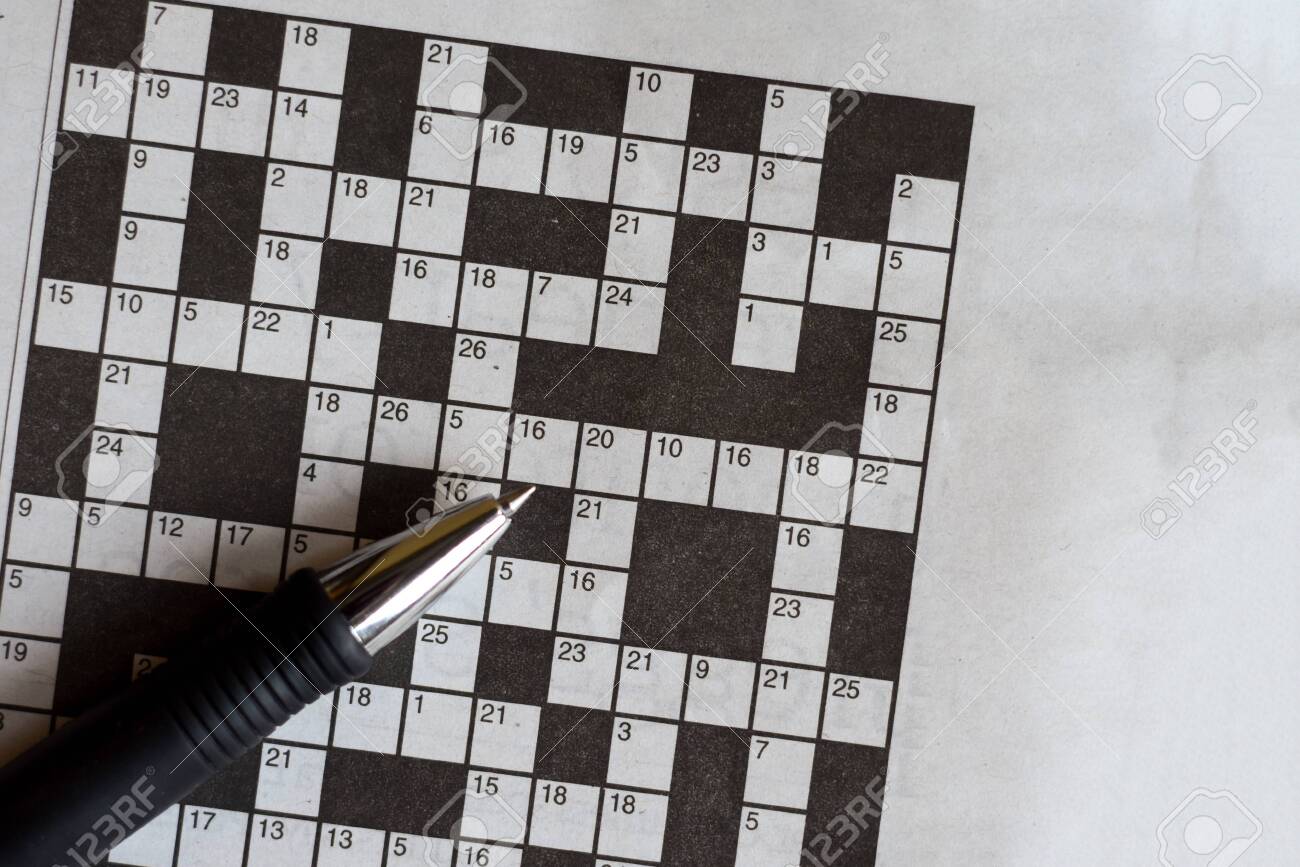 Crossword Puzzle From Newspaper With A Pen To Fill In Answers Stock Photo Picture And Royalty Free Image Image 138184116