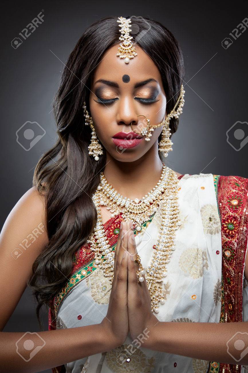 Young Indian Woman Dressed In Traditional Clothing With Bridal